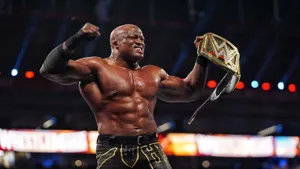 Bobby Lashley Roaring Triumphantly With Championship Belt Wallpaper