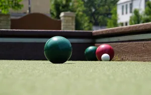 Bocce Ball Game In Action Wallpaper