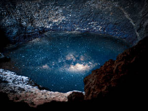 Body Of Water Reflecting Night Sky Wallpaper