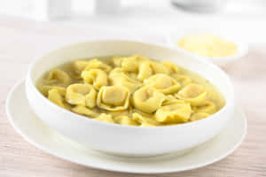 Bowl Full Of Tortellini In Brodo Wallpaper