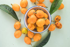 Bowl Of Loquat Fruits Wallpaper