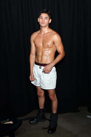 Boxing Champion Ryan Garcia Standing Tall Wallpaper