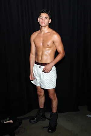 Boxing Champion Ryan Garcia Standing Tall Wallpaper