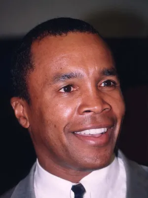 Boxing Legend Ray Leonard Dazzles In A Suit Wallpaper