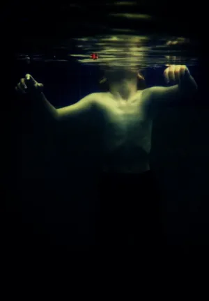 Boy Swimming Underwater Iphone Wallpaper