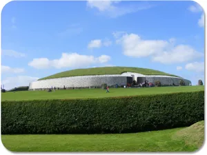 Boyne Valley Newgrange With Grass And Blue Sky Wallpaper