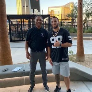 Brad Tavares Celebrating Victory With A Thumbs-up Wallpaper