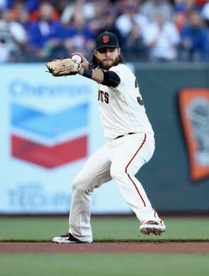 Brandon Crawford Throwing A Ball Wallpaper