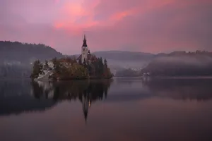 Breathtaking Twilight Scene In Lake Bled Wallpaper
