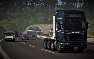 Breathtaking View Of A Freight Truck On The American Highway Wallpaper