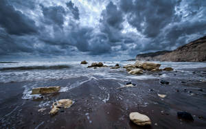 Breathtaking View Of Rocky Coast Wallpaper