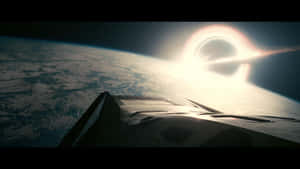 Breathtaking View Of The Interstellar Black Hole Wallpaper