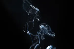 Breathtaking White Smoke Flowing Through The Air Wallpaper