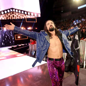 Brian Kendrick In His Signature Purple Trouser Wallpaper