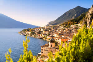 Bright Sunset In Lago Di Garda Wallpaper