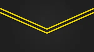 Brighten Your Workspace With A Cheery Yellow Wallpaper Wallpaper