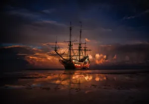 Brown Ship On Sea During Sunset Wallpaper