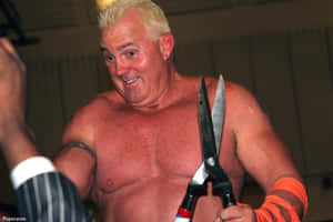 Brutus Beefcake Holding His Huge Scissors Wallpaper