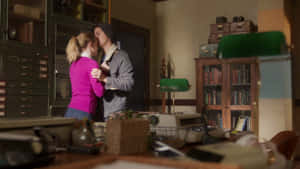 Bughead Intimate Moment Office Scene Wallpaper