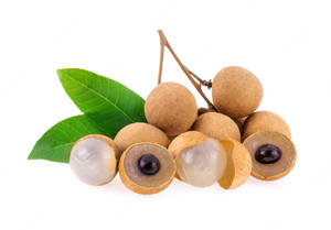 Bunch Of Longan Fruits With Leaves Wallpaper