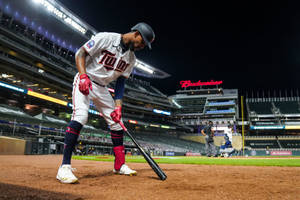 Byron Buxton On Field At Night Wallpaper