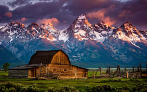 Cabin In The Middle Of A Field Wallpaper