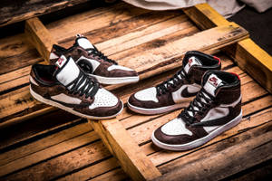 Cactus Jack Travis Scott Nike Jordans On Wood Wallpaper