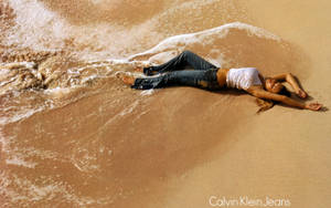 Calvin Klein Model On Beach Wallpaper