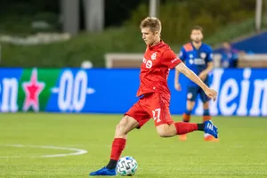 Canada National Football Team's Star Player, Liam Fraser In Action Wallpaper