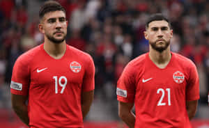 Canadian Soccer Players Cavalliniand Teammate Wallpaper