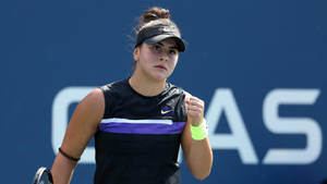 Canadian Tennis Prodigy Bianca Andreescu Showcasing A Focused Expression Wallpaper