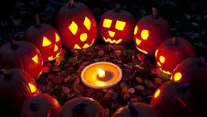 Candle With Scary Pumpkin Halloween Phone Wallpaper