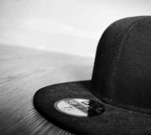 Cap In Black Aesthetic Photography Wallpaper