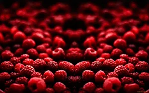 Caption: A Cluster Of Fresh Raspberries At Peak Ripeness Wallpaper