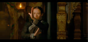 Caption: A Fierce Contest: Chess Grandmaster In Deep Contemplation Wallpaper