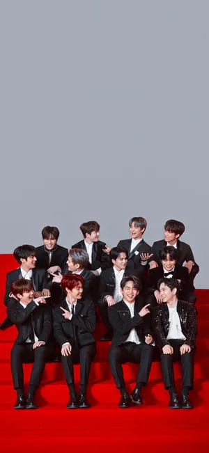 Caption: A Shining Treasure Chest On Red Carpet Wallpaper