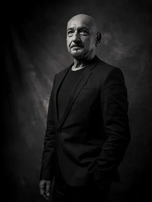 Caption: Accomplished English Actor - Ben Kingsley In A Monochrome Portrait Wallpaper