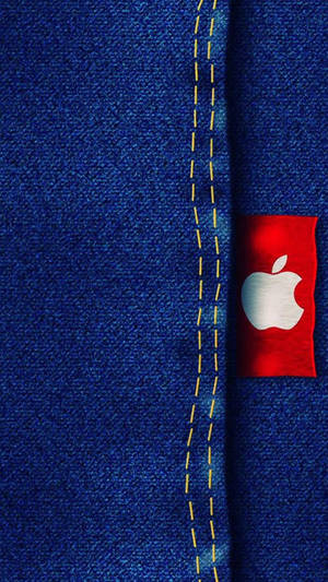Caption: Apple Logo On Classic Denim Fabric Wallpaper