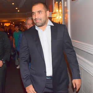 Caption: Blagoy Ivanov - Dressed To Impress In A Classic Suit Wallpaper