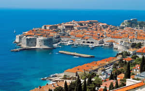 Caption: Breathtaking View Of Dubrovnik's Historic City Walls Wallpaper