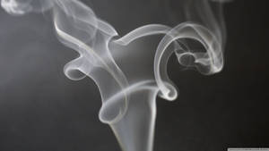 Caption: Captivating Swirls Of White Smoke Wallpaper