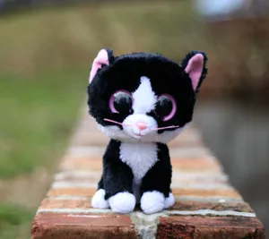 Caption: Cuddle Up With The Adorable Beanie Boos Cat Wallpaper