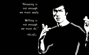 Caption: Embody Determination With Bruce Lee - Never Give Up Wallpaper