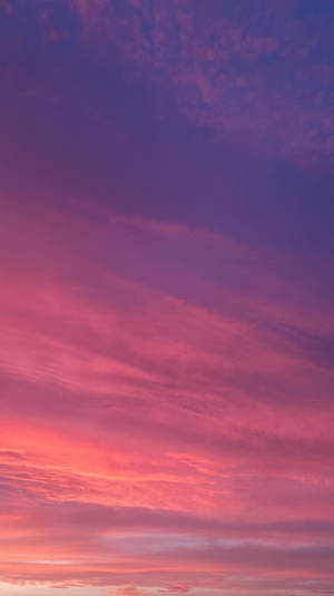 Caption: Embrace The Palette Of Life With Aesthetic Sunset Wallpaper