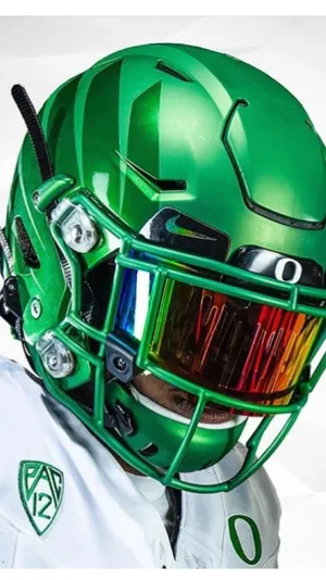 Caption: Exciting Oregon Ducks Football Game Wallpaper