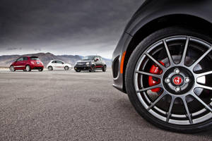 Caption: Fiat 500 Abarth Cars In A Row Wallpaper