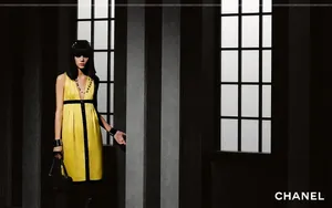 Caption: Influential Supermodel Freja Beha Erichsen Against A Calming Blue Backdrop. Wallpaper