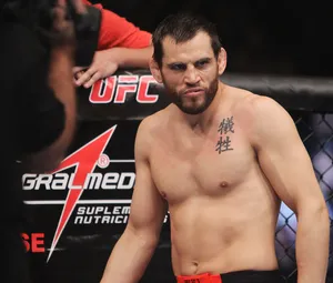Caption: Jon Fitch's Intense Stare At Ufc 141 Event Wallpaper