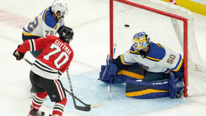 Caption: Justin Faulk Celebrates After Scoring The Winning Goal Wallpaper