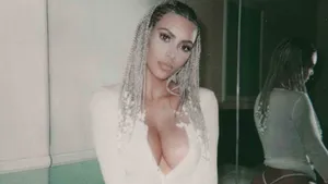 Caption: Kim Kardashian Flaunting Her Elegant Style Wallpaper